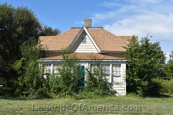 Lebanon, KS - Overgrown House