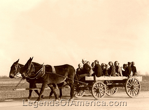 Home from school in a wagon.