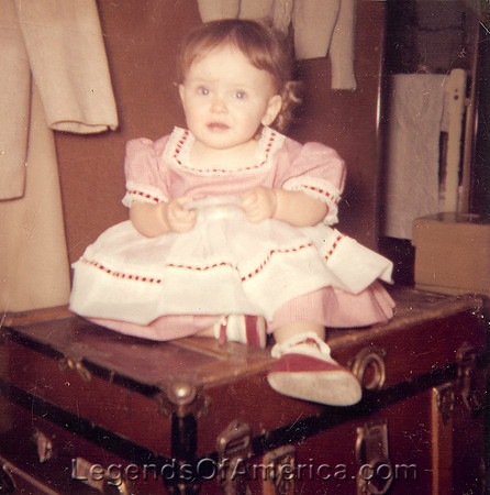 Kathy Weiser sitting on William Carson's Chest