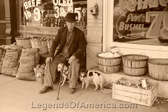 Robinson, IL - Man and dogs in front of grocery store