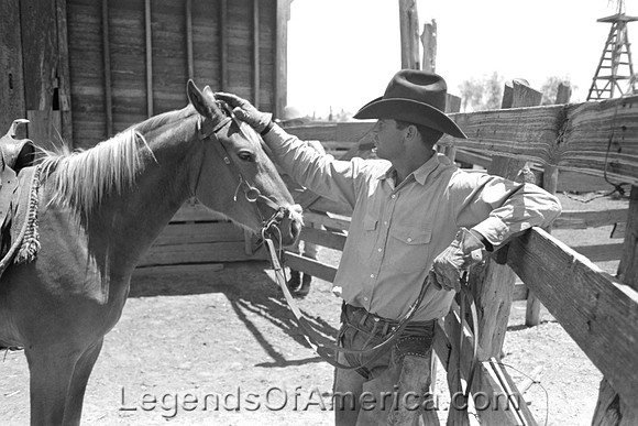Spur, TX - Cowboy Petting His Horse