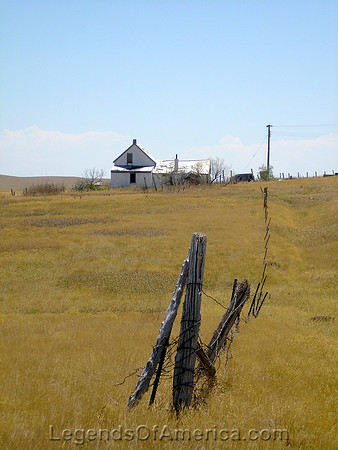 Okaton, SD - Fence & House